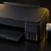 インクタンク式の家庭用プリンターと予備インクボトル
